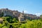 Little medieval town skyline of Grotte di Castro, Lazio, Italy, with blue sky in background