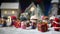 Little miniature city with road and lights. Decorative cute small houses in snow at night in winter. Creative Holiday concept.