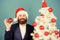 Little miracle. happy holidays. winter season sales. merry christmas. bearded man santa hat hold xmas ball. magic