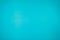 A little mottled bright blue turquoise paper plain and solid for minimal object background