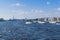 Little Neva River with sightseeing boats and two hydrofoils and Betancourt Bridge  in Saint Petersburg, Russia