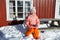 Little norwegian girl with an ice floe in hand