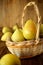 Little pears in a wicker basket