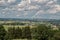 Little plane approaching and the green german countryside