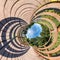 Little planet transformation of spherical panorama 360 degrees. Spherical abstract aerial view on wooden bridge. Curvature of