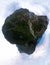 Little planet view of a Shdugra waterfall among the high Caucasian mountains, Mount Ushba in the background. Valley in the Mazeri