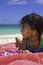 Little Polynesian girl at the beach