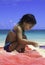 Little Polynesian girl at the beach