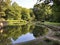 Little pond with crane bird statue in the Spa garden Julijes park or Umjetno jezerce sa statuom zdrala u Julijevom parku