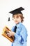 Little professor in academic hat with old abacus on white background