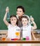 Little pupils study chemistry with their teacher