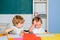 Little ready to study. Funny toddlers from elementary school. Kids funny education. Preschool childrenhaving fun in
