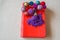 Little red book with beads on the table