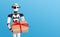 Little robot holding gift box, blue background with empty space.