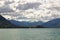 Little sail boat in the middle of lake Tekapo, New Zealand