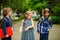 Little school students have started a game on the schoolyard.