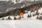 Little skier performs jump in the snow