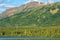 A little snow on the mountaintops at Kiniskan Lake Provincial Park in British Columbia, Canada