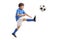 Little soccer player kicking a football in mid-air