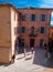 Little square and buildings in Roussillon village in France