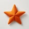 Little Star Orange Cashmere Felt Toy Image In The Style Of Bjarke Ingels And Marc Quinn