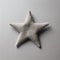 Little Star: A Textured Cashmere Sculpture On A Clean Background