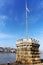 Little stone tower with flag marking the Lipotvaros harbor. The Danube river and a part of the right bank of Budapest