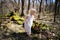 Little Toddler Girl Exploring Nature in the Woods