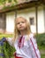 Little ukrainian girl watching magpie