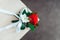 Little wedding boutonniere with roses with white ribbon