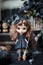 Little witch. Happy Halloween. Custom Blythe doll dressed up as a witch apprentice holding broomstick. Her familiar cat is walking