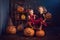 little witches with Halloween pumpkins indoor