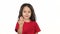 Little woman waves her hand to herself at white background. Slow motion