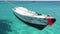 Little wooden boat floating in the Red sea, Egypt