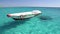 Little wooden boat floating in the Red sea, Egypt