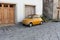 Little yellow compact Italian car