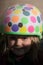 Little young girl wearing cycle helmet