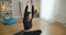 Live camera follows movement of hands of confident female yogi sitting on exercise mat doing breathing exercises. Angle