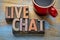 Live chat word abstract in wood type