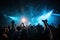 Live shows, rock concert, parties, festivals, nightclub Cheering crowd, stage lights and confetti. Cheering.by