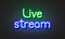 Live stream neon sign on brick wall background.