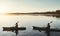 We live to love and love to kayak. a young couple kayaking on a lake outdoors.