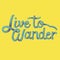 Live to wander quote on background