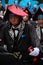 Lively Japanese male dancer wearing red hat