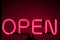 Lively Nights: Neon \\\'Open\\\' Sign Illuminating the Bar