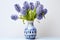 Lively Spring hyacinths floral plant vase. Generate Ai