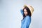 Lively young woman laughing with cowboy hat