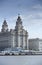 Liverpool skyline, a scene across the River Mersey showing Pier Head, with the Royal Liver Building, Cunard Building and Port of L