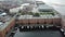 A Liverpool waterfront neighborhood with boats in it and a Ferris wheel