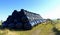 Livestock feed, silage, in black plastic bales